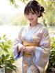 A woman in a kimono standing in front of a lake.