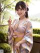 A woman in a kimono posing for a picture.